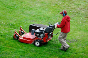 Tri State Cleaning lawn mowing person